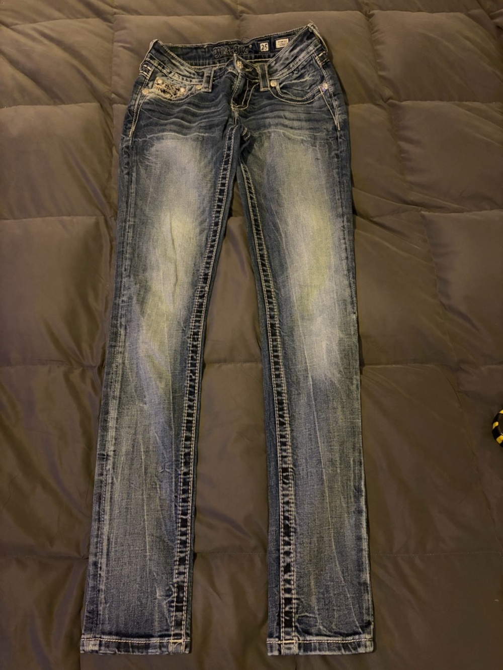 Miss Me Distressed Light Wash Skinny Jeans.